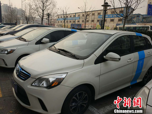 北京街头的“共享汽车”。<a target='_blank'  data-cke-saved-href='http://www.chinanews.com/' href='http://www.chinanews.com/' >中新网</a>记者 李金磊 摄